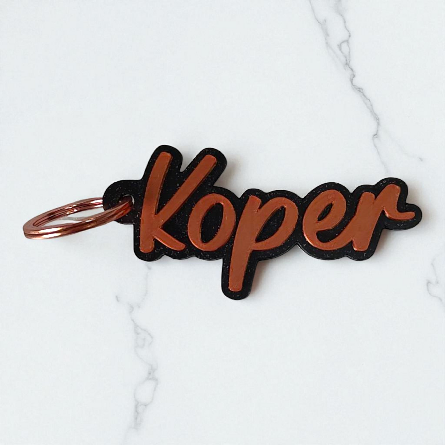 sleutelhanger met naam sierlijk glitter zwart koper