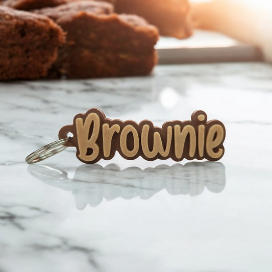 gepersonaliseerde sleutelhanger met naam handgeschreven bruin koekjesdeeg