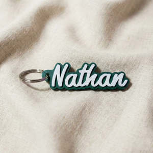 Groene sleutelhanger met naam Nathan als schoencadeautje